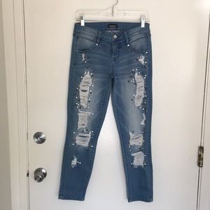 Bebe bedazzled/studded distressed Denim